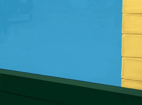 a tom and jerry cartoon with a red hat on