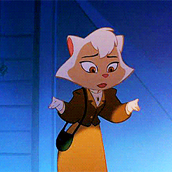 a cartoon cat wearing a brown jacket and a yellow dress