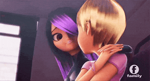 a couple of cartoon characters are hugging each other .