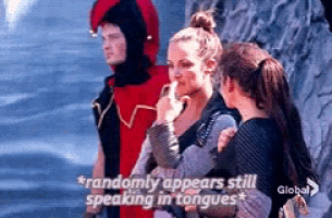 a group of people standing next to each other with a caption that says randomly appears still speaking in tongues .