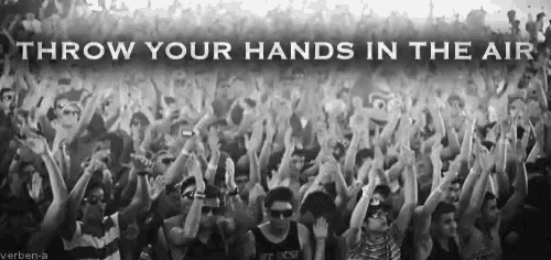 a black and white photo of a crowd with the words throw your hands in the air above them