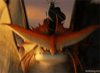 a close up of a cartoon dragon with the words levitating-fox below it