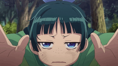 a girl with blue eyes is making a funny face with her hands outstretched