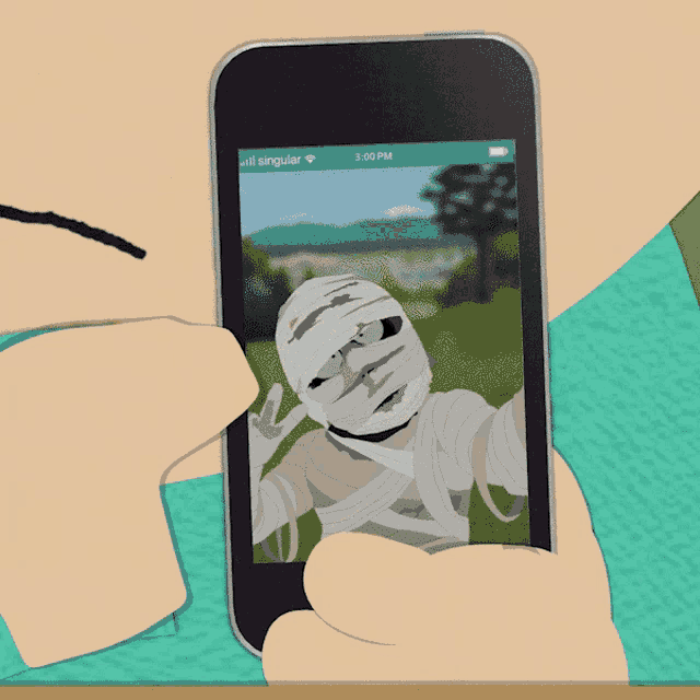 a person is taking a picture of a mummy on their cellphone