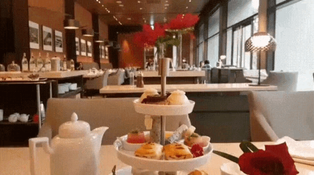 a table with a tray of food on it in a restaurant