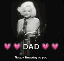a black and white photo of marilyn monroe singing into a microphone with the words `` dad happy birthday to you . ''