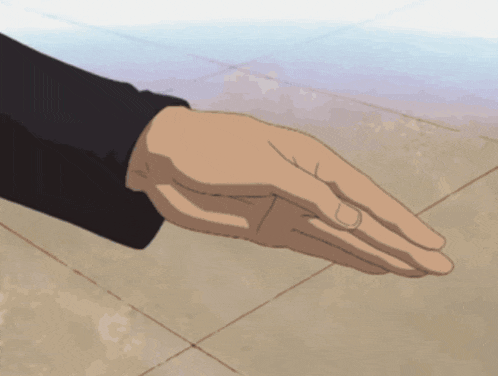 a close up of a person 's hand reaching out