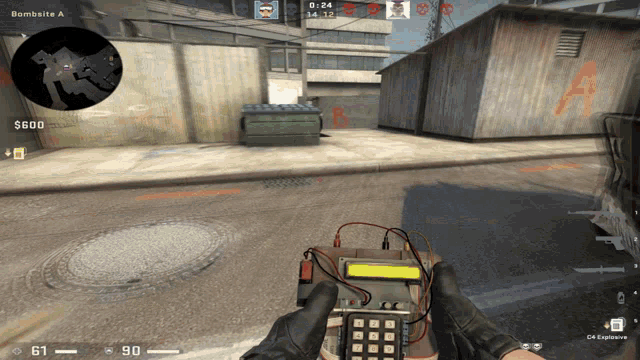 a person holding a bomb in front of a building with the word bombsite a on it