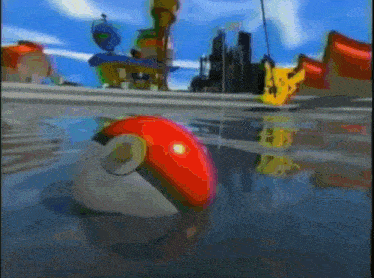 a red ball is floating in the water with a pikachu in the background