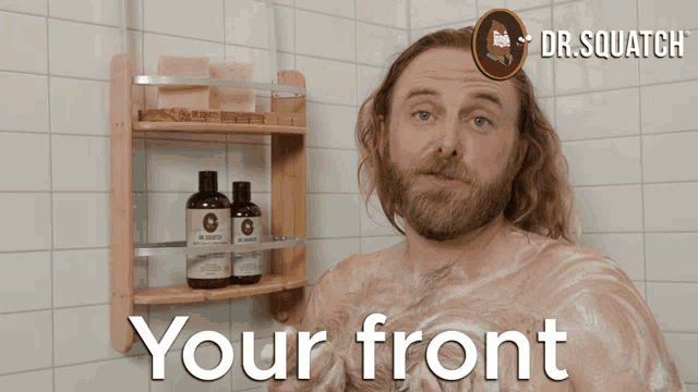a man taking a shower with the words " your front " written above him