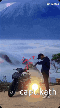 a picture of a man standing next to a motorcycle with the caption capt.kath