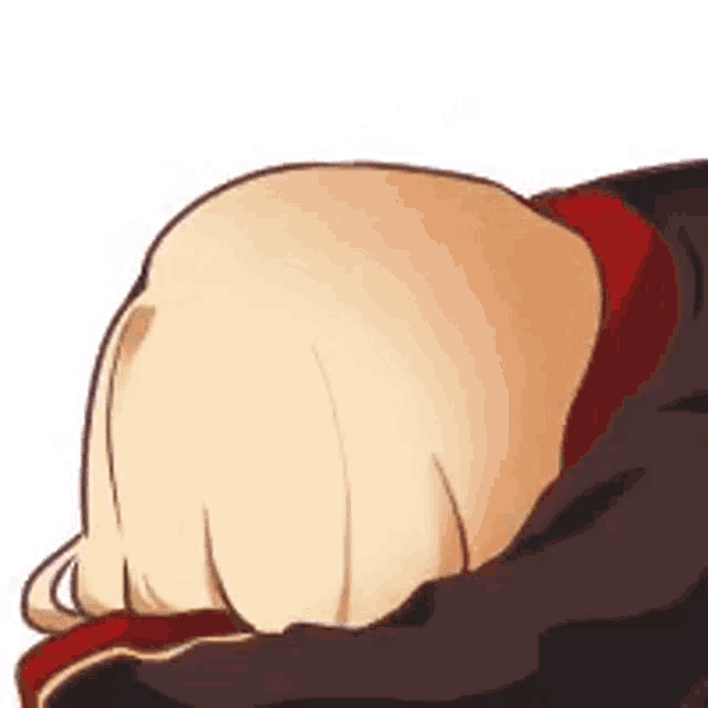 a close up of a person laying down with their head on their arms .