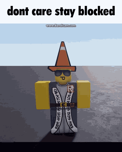 a cartoon character with a cone on his head and the words " dont care stay blocked " on the bottom