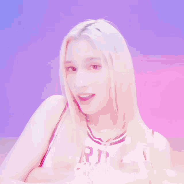 a girl with blonde hair is wearing a red white and blue outfit with the word choom on it
