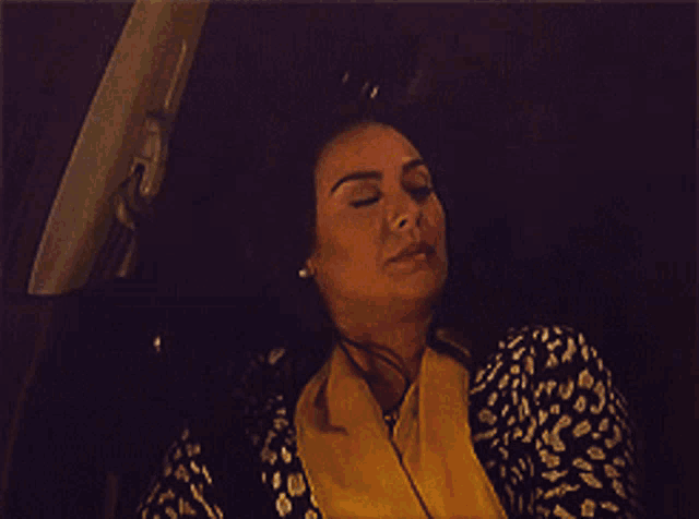 a man and a woman are talking in a car and the woman is saying ikaw