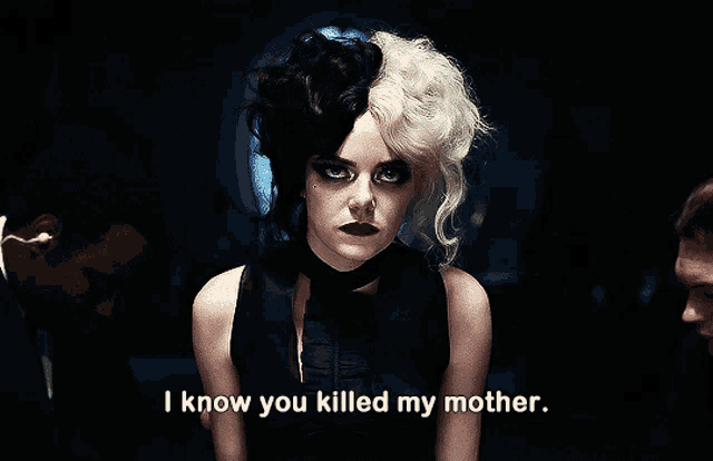 a woman with half black half white hair says i know you killed my mother