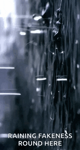 a picture of rain drops falling on a wall with the words raining fakeness round here .