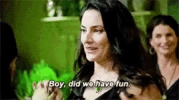 a woman is talking to another woman and saying `` boy , did we have fun '' .