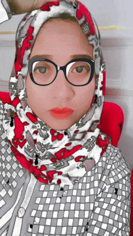 a woman wearing glasses and a red and white scarf is taking a selfie