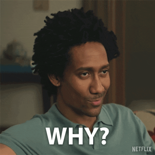 a man in a blue shirt says why