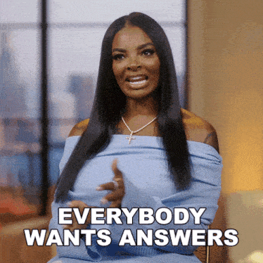 a woman says everybody wants answers while wearing a blue sweater