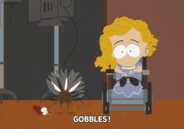 a cartoon of a girl in a wheelchair with the words gobbles below her