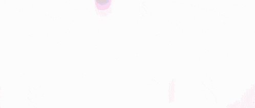 a person in a wheelchair is walking up a set of stairs with a light coming from the top .