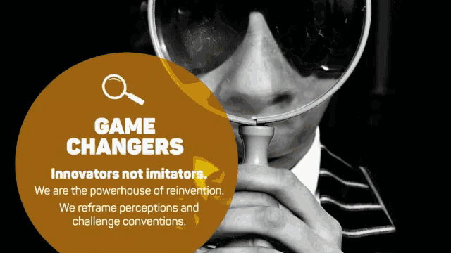 a man holding a magnifying glass with the words game changers on it
