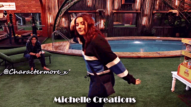a woman standing in front of a pool with michelle creations written on the bottom right