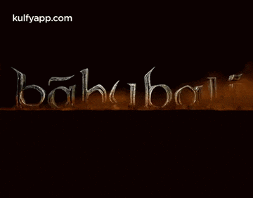 a dark background with the word baharbali written in gold