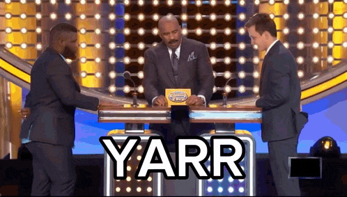 two men on a game show with the word yarr on the bottom right