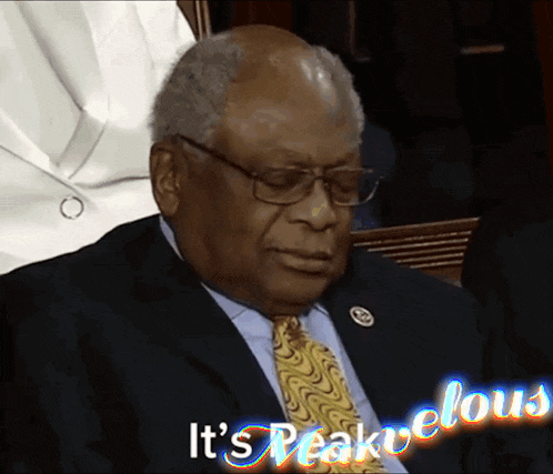 a man in a suit and tie says it 's freakylicious
