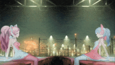 two anime girls are sitting next to each other in front of a city