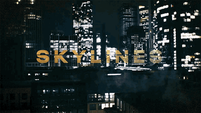 a city skyline at night with the words skylines written in gold