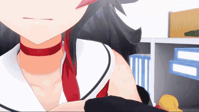 a close up of a girl 's neck with a red ribbon