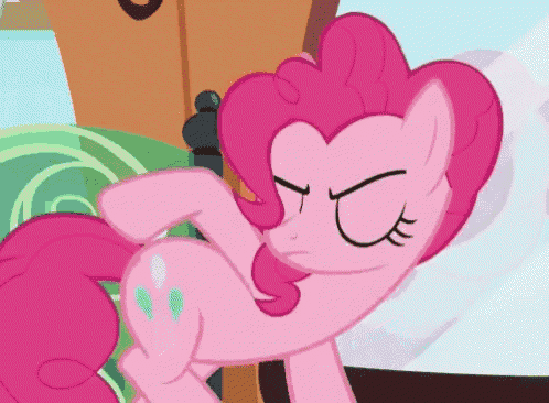 pinkie pie from my little pony has her eyes closed and a serious look on her face