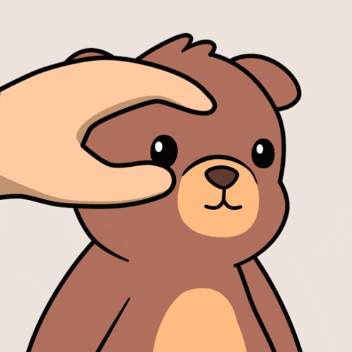 a person petting a brown teddy bear 's head with their finger