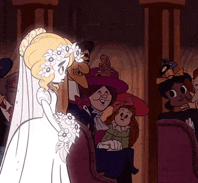 a bride in a wedding dress is surrounded by people