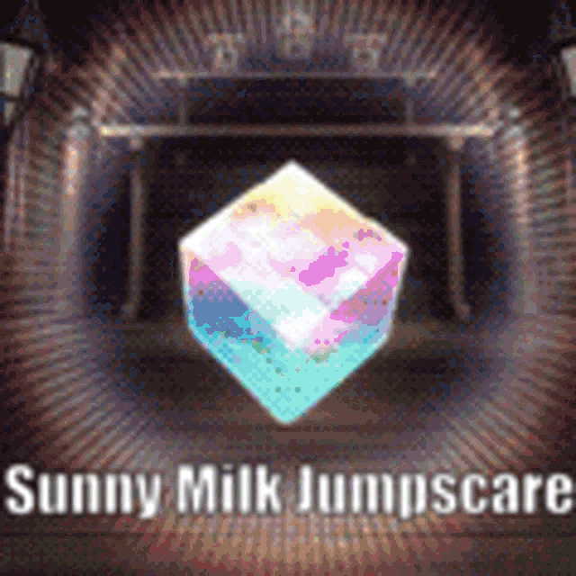 a colorful cube with the words `` sunny milk jumpscare '' written on it is in a dark room .
