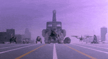 a group of robots are driving down a road