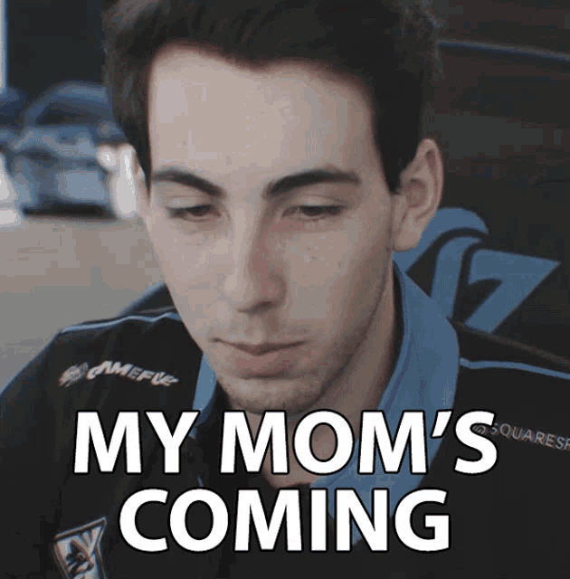 a man says my mom 's coming while wearing a gamefuel jacket