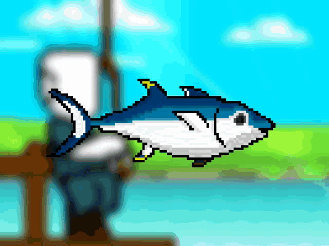 a pixel art drawing of a blue and white fish with a yellow tail