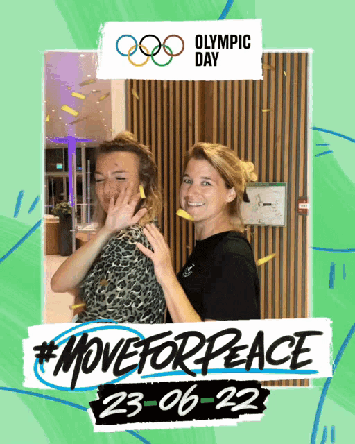 two women pose for a photo for olympic day on june 23