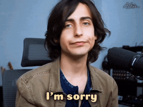 a young man with long hair says i 'm sorry