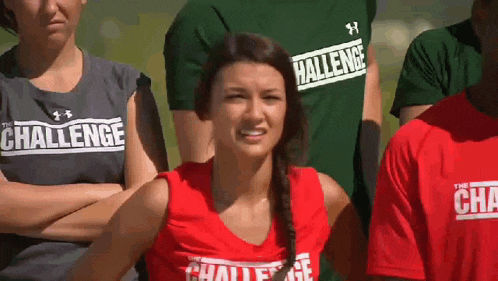 a group of people wearing shirts that say challenge