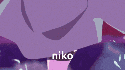 a close up of a person 's face with the word niko on the bottom
