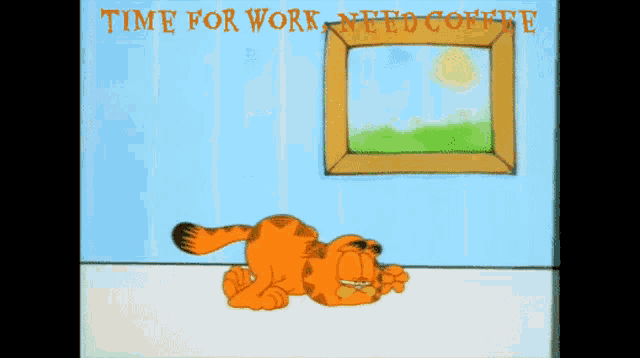 garfield laying on a table with a cup of coffee