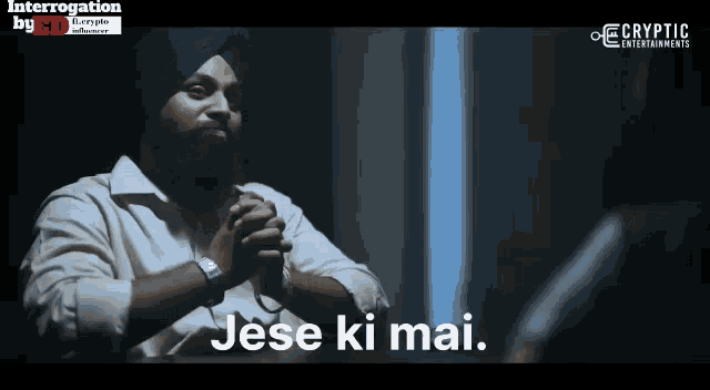 a man in a turban is sitting at a table with his hands folded and the words jese ki mai above him