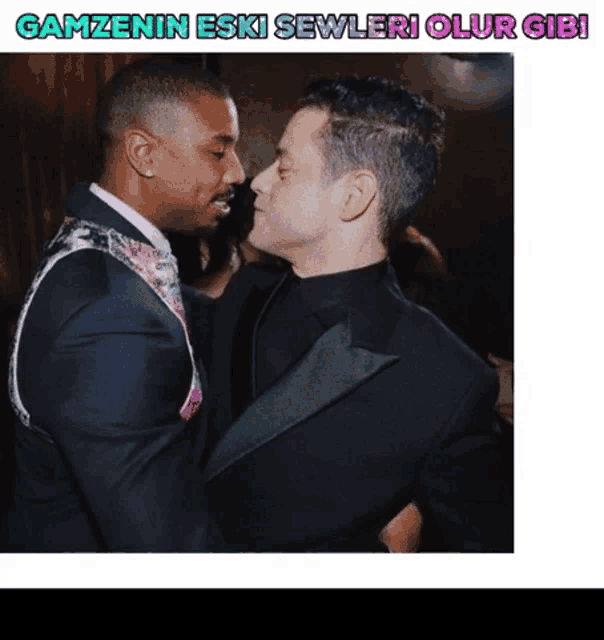 two men in suits are looking at each other with the words gamzenin eski sewleri olur gibi above them