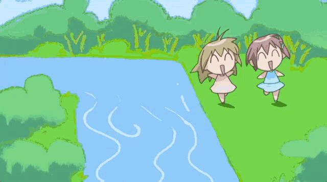 two girls are standing next to a river with trees in the background